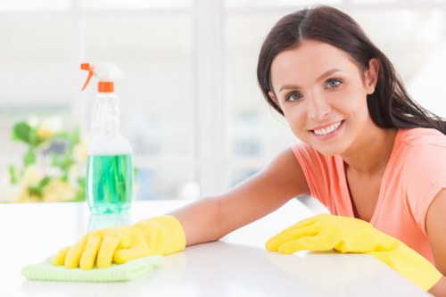Carpet cleaning team preparing equipment safely before a job